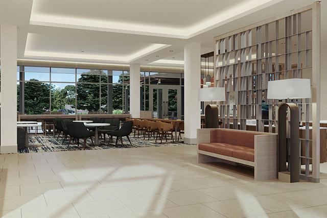 Homewood Suites main entry lobby with brand compliant decorative chandeliers and sconces