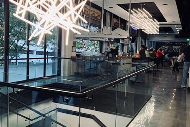 Hotel Indigo Chattanooga modern lobby featuring custom LED ceiling lighting fixtures