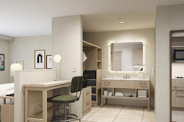 Homewood Suites king studio suite design with UL certified residential style lighting