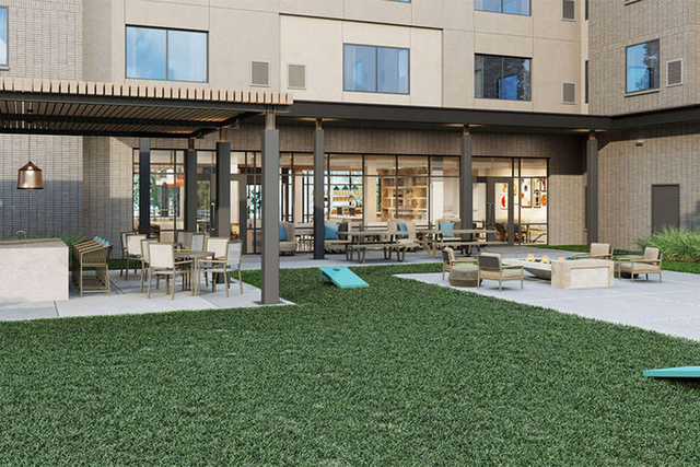 Homewood Suites outdoor patio area with weather resistant UL wet location lighting