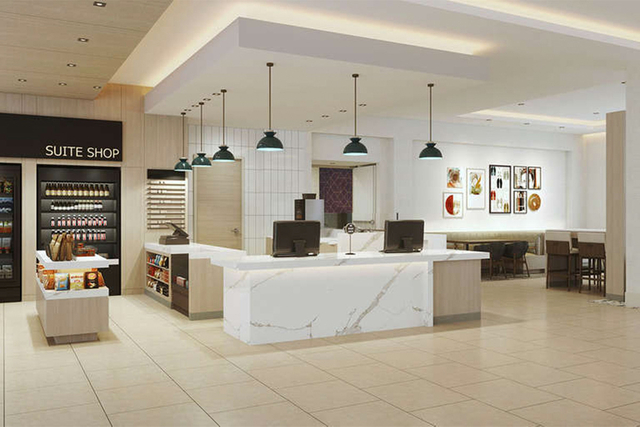 Homewood Suites lobby suite shop with Hilton brand compliant black pendant lights
