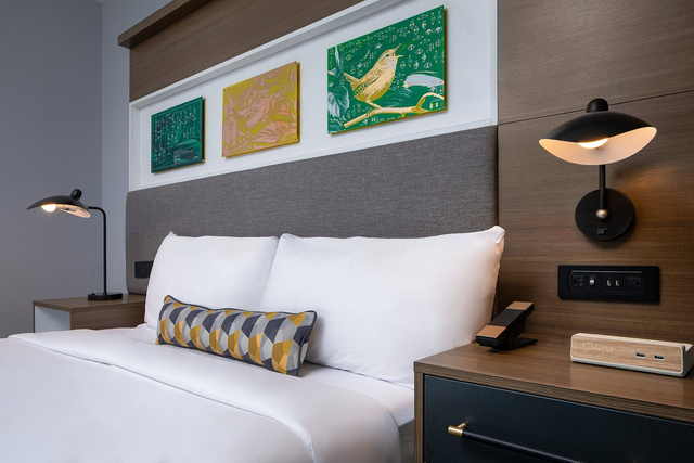 Deluxe hotel guestroom with UL certified LED bedside reading lights
