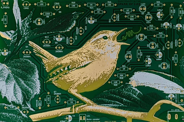 Custom hotel lobby artwork with LED accent lighting on decorative circuit board design