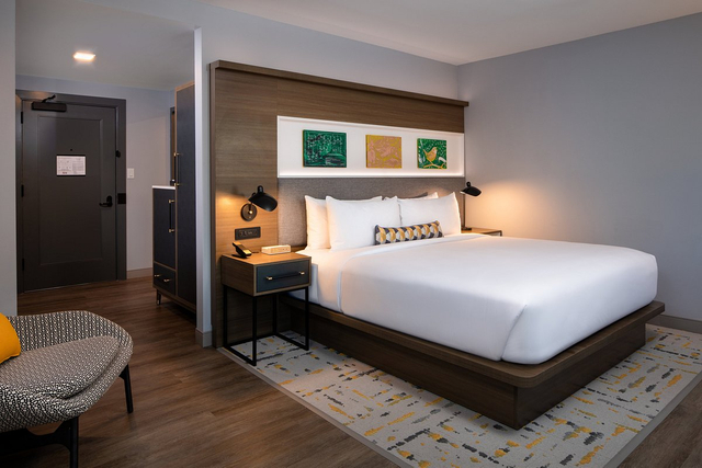 Deluxe king room with custom hotel lighting package and LED TV backlighting