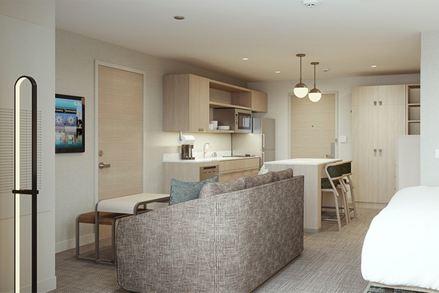 Homewood Suites suite living area with UL listed table lamps and dimmable LED fixtures