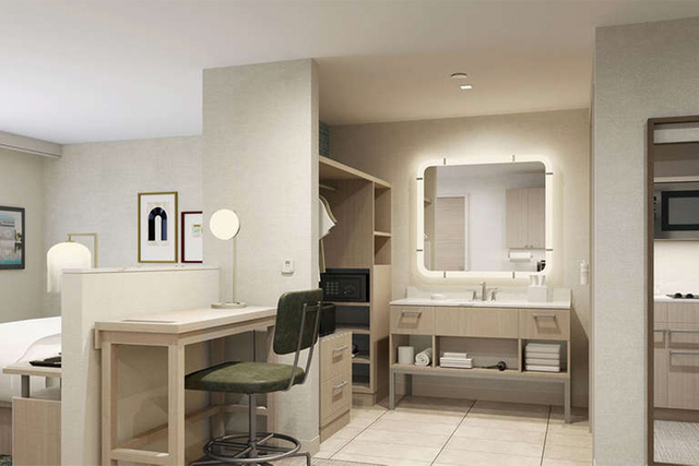 Homewood Suites studio suite kitchen with UL certified pendant lights over island